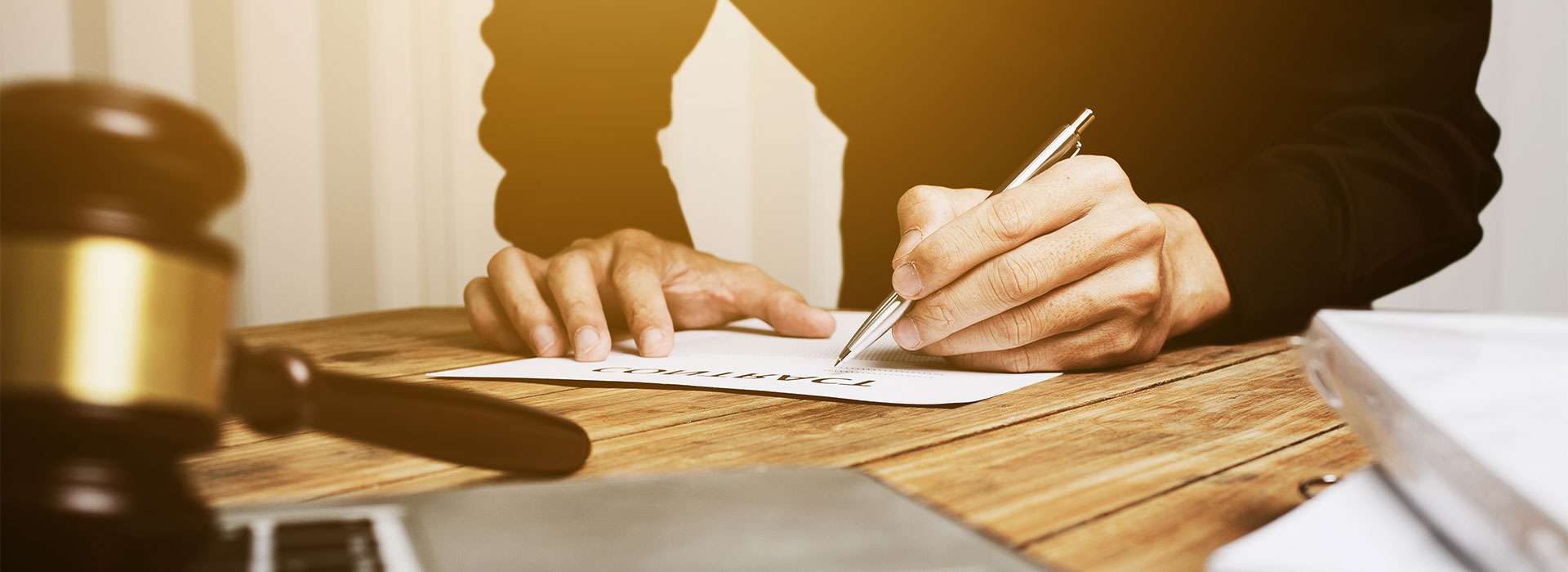 A Litigation solicitor in Limerick signing a document